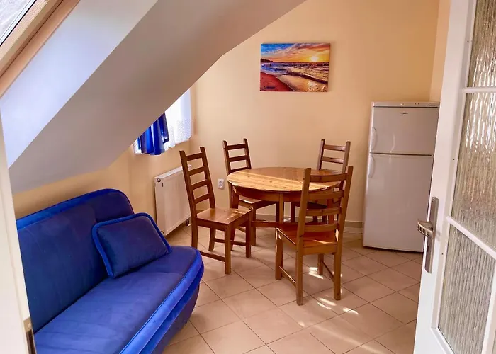 Проживание в семье Pod Szumiacym Debem