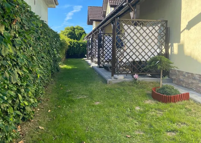 Проживание в семье Pod Szumiacym Debem